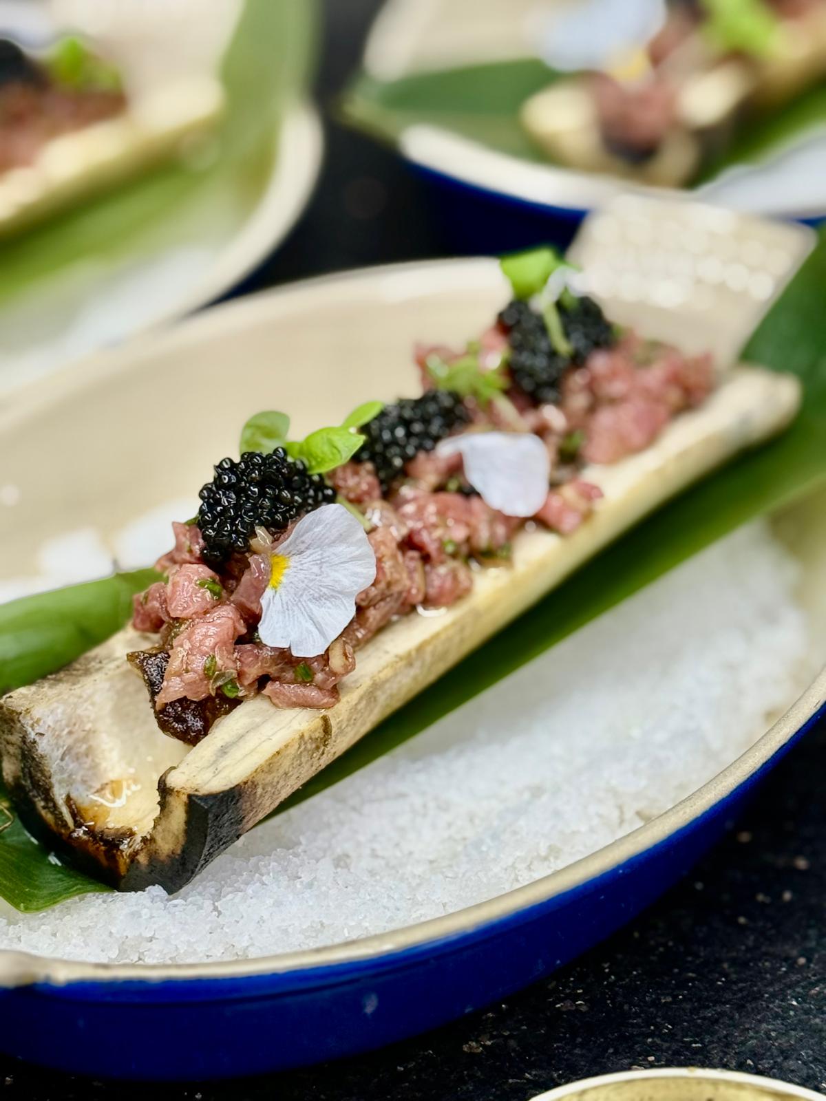 Antoine Piccolo's Italian Alps Transmontanus caviar enhances steak tartare with firm black pearls adding clean mineral notes and buttery texture